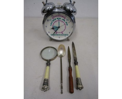 Mother of pearl and brass spoon, ornate magnifying glass and letter opener and one other letter opener plus a retro Wogan ala