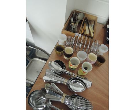 A selection of various flatware and egg cups etc