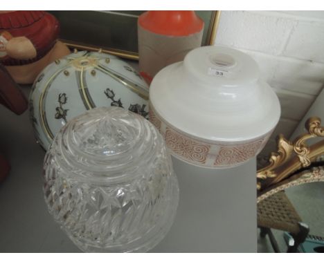 Three light shades and a glass lamp shade