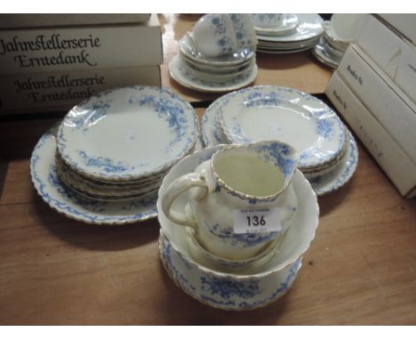 A vintage part tea service in blue and gilt