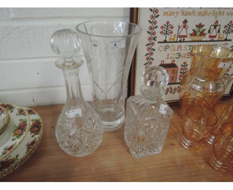 Two cut glass decanter and a vase