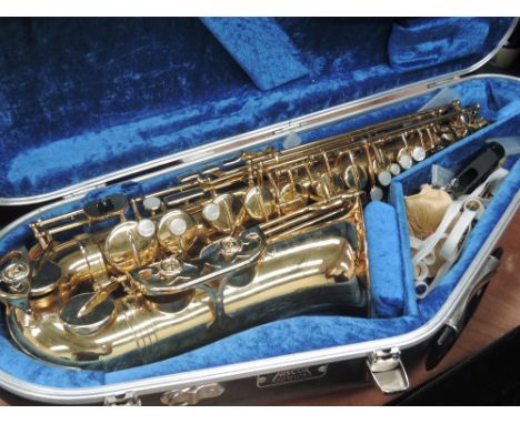 An Evette buffet crampon saxophone, in fitted case