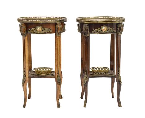 Pair of 20th century French walnut and marquetry two-tier occasional tables, each with marquetry inlaid circular galleried to