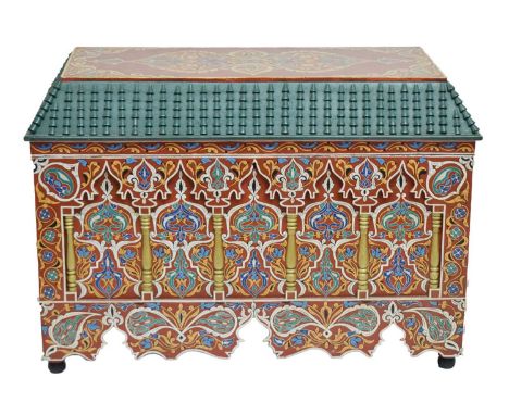 North African architectural-style red ground trunk with foliate decoration, 103cm x 51cm x 69cm high