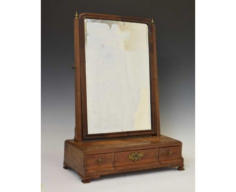 18th century walnut swing dressing mirror with bevelled plate in crossgrain-moulded surround over three drawers with flared l