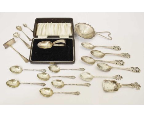 Assorted silver including four golfing spoons, Sheffield 1940s, tea strainer, George VI Scottish caddy spoon with Celtic cros