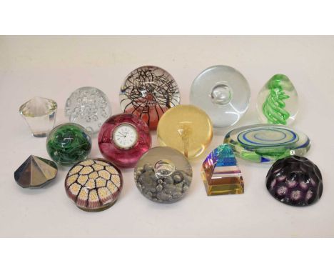 Collection of glass paperweights to include; Caithness pink example with inset clock, Hippocampus, Selkirk Glass limited edit