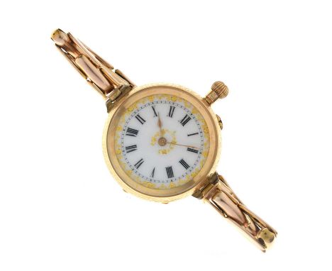Early 20th century lady's yellow metal stamped 14K (front and back) fob watch, having a white enamel Roman dial with gilt met