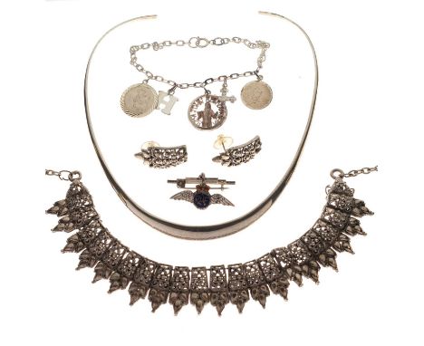 Assorted silver and white metal jewellery comprising a silver and enamel RAF wings brooch, a silver torq necklace, a silver c