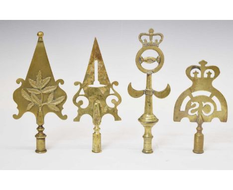 Four Friendly Society brass staff heads, comprising one of pierced trowel form; another with cast foliate decoration, possibl