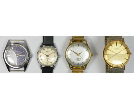 Caravelle, a stainless steel automatic day/date gentleman's wristwatch, 36mm, an unbranded gilt metal calendar manual wind wr