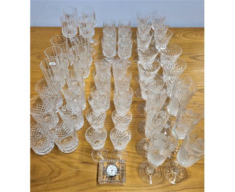 A collection of Waterford crystal drinking glasses, comprising of - six white wine, six red wine, six whiskey, six champagne 