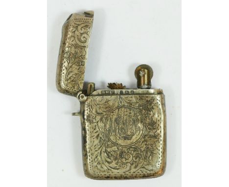 A silver vesta case converted to a cigarette lighter, Birmingham 1918, initialed. 