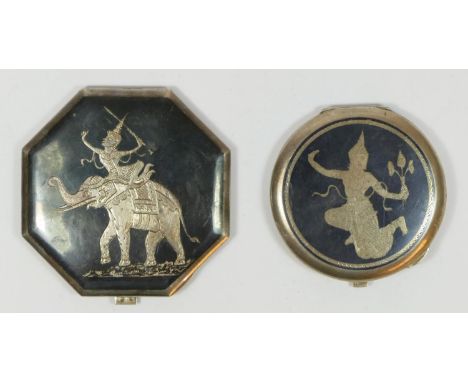 Two Siamese silver and enamel compacts, with Deity decoration, mirrors in both.