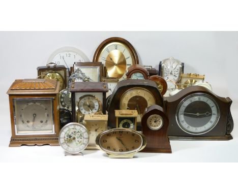 A collection of mid 20th century mantle clocks and wall clocks, having manual and quartz movements. (4) 