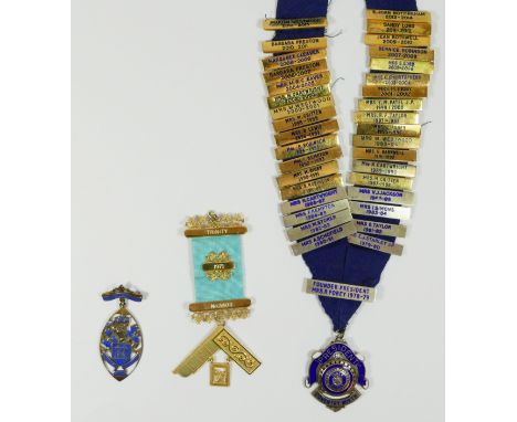 A silver gilt Masonic Jewel, Trinity Lodge, no. 3403, a silver and enamel Past Mayoress Wishbech jewel and a silver and ename