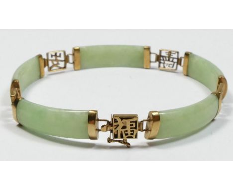 A 9K gold mounted jade panel link bracelet, 19.5cm 
