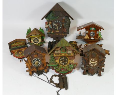 A collection of seven mid 20th century cuckoo clocks, having manual wind Swiss &amp; German one day movements. (spares or rep