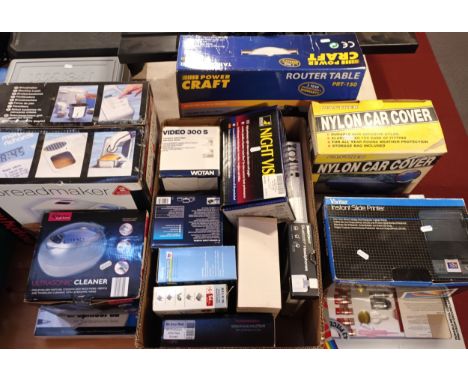 A collection of electrical household items to include a Morphy Richards bread maker, an ultrasonic cleaner, a graphics pad, n