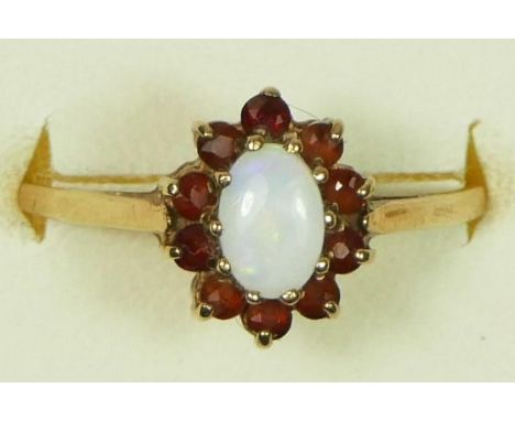 A 9ct gold opal and garnet cluster ring, O 1/2, 1.3gm 