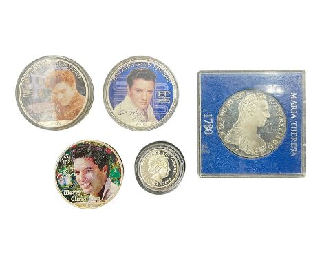 Three United States of America 2002 one ounce fine silver coins each with applied Elvis commemorative stickers, Queen Elizabe