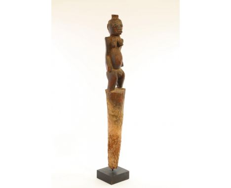   Togo, Fon, protective figure, bochio robust expressively carved ancestral female figure on a pole. With layers of encrusted