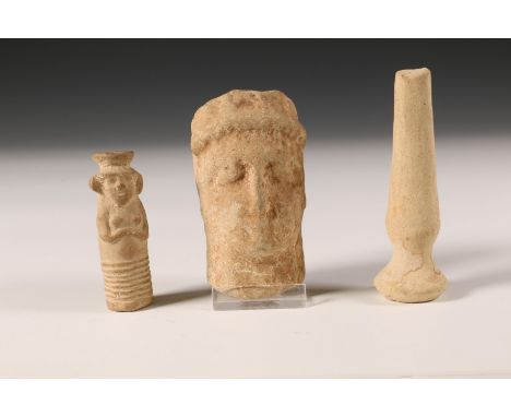   Antique stone buste of a man, possibly Roman Herewith a terracotta female figure and a Roman earthenware flask. Provenance: