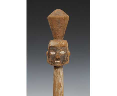   Peru, Chancay, light wooden funerary head on a staff, 1000-1494 AD with a carved janus head with a double conical protrusio