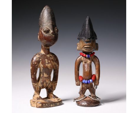   Nigeria, Yoruba, Igbomina Ajasse, male twin figure, with grimacing face, metal and beaded ornaments and an Igbomina, Abba M