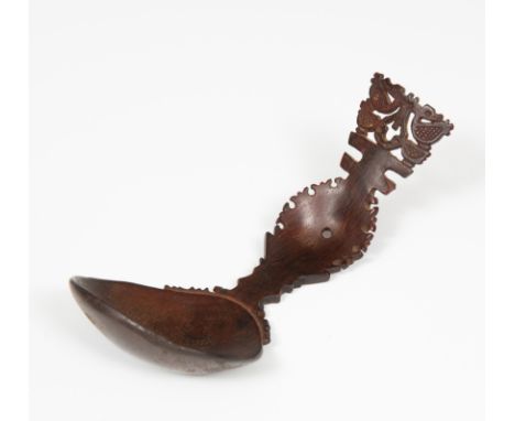   Timor, a fine carved horn spoon, topped with four birds and fine carving at the back. Provenance collection Leo Slangen, Am