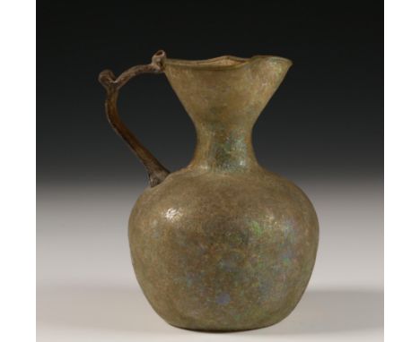   Roman glas pitcher with decorated arm, adorned bottom, 1st-3rd century. Provenance: collected 1970s till early 1990's, priv
