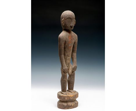   Philippines, Ifugao, fine carved standing ancestral figure, bulul, 1st half 20th century, with carved collar bones, knees a