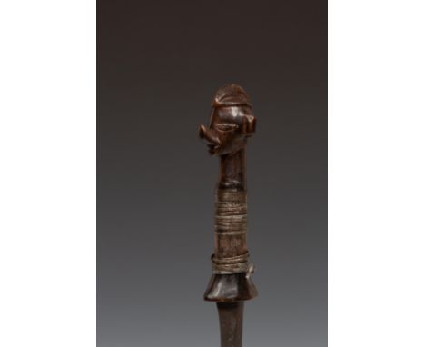   DRC, Yaka, ceremonial sword with a carved bust on top. 47,5 cm. [1]          