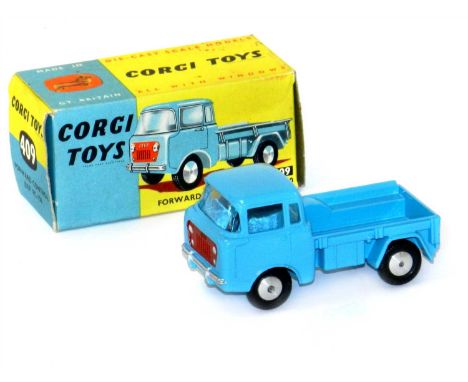 Corgi 409 Forward Control Jeep FC-150 boxed. In pale blue with red grill, with Corgi Club leaflet, pristine condition.