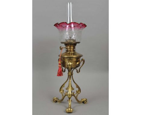 A good quality late 19th century oil lamp stand, of scrolling tripod form in the Art Nouveau style, in the manner of W.A.S Be