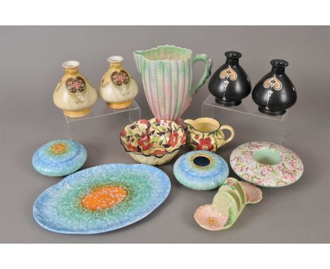 A group of early-mid 20th century decorative ceramics, to include E Radford vases, two pairs of Shelley vases in blush ivory 