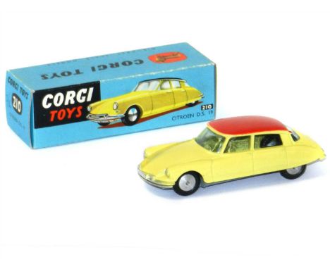 Corgi 210 Citroen DS19, boxed. In pale yellow with red roof. Box marked "3/6" otherwise pristine, with folded Corgi coloured 