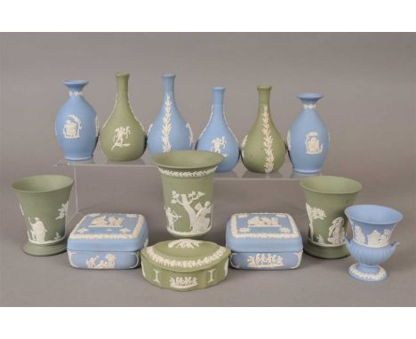 A small collection of thirteen pieces of Wedgwood jasperware in blue and green, comprising three trinket boxes and covers and