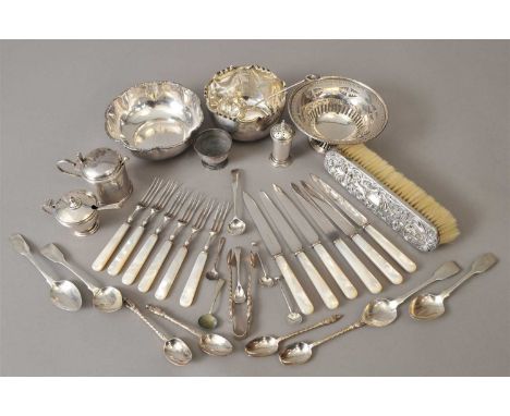 A small silver pierced pedestal dish, together with a set of three silver cruets, a silver backed brush, silver spoons and a 