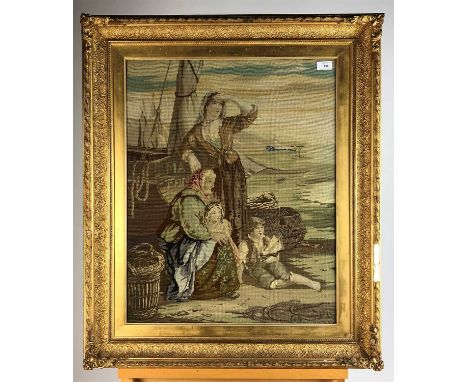 British school, late 19th century, Tapestry of a fishermans family waiting on a beach, in a gilt composite frame, 65 x 52cm