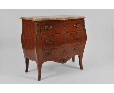 An early 20th century Louis XV style kingwood, walnut and boxwood strung bombe commode, the shaped marble top with a bevelled