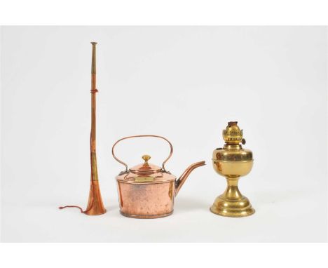 A Victorian copper kettle, with an applied brass cartouche marked 'water level of spout', a brass banded copper horn and a br