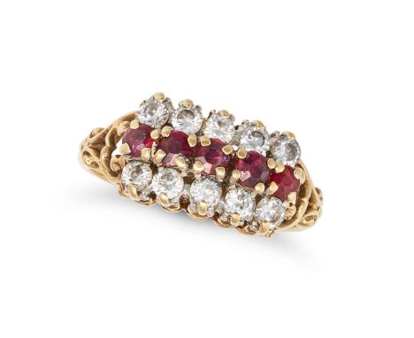 A VINTAGE RUBY AND WHITE GEMSTONE RING in 9ct yellow gold, set with a row of round cut rubies, accented by rows of round cut 