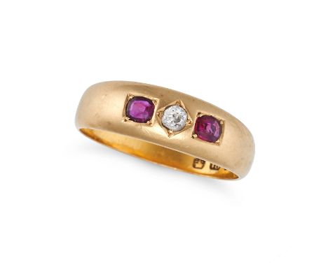 NO RESERVE - AN ANTIQUE RUBY AND DIAMOND GYPSY RING in 18ct yellow gold, set with an old cut diamond between two cushion cut 