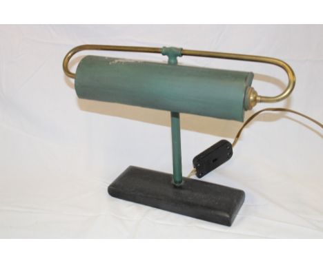 A 1930's brass and painted metal bankers-style desk lamp on black slate base