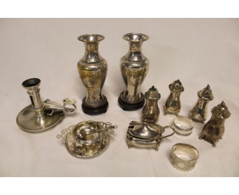 A pair of silver plated spill vases with engraved decoration, silver plated cruet items, chamber candlestick etc