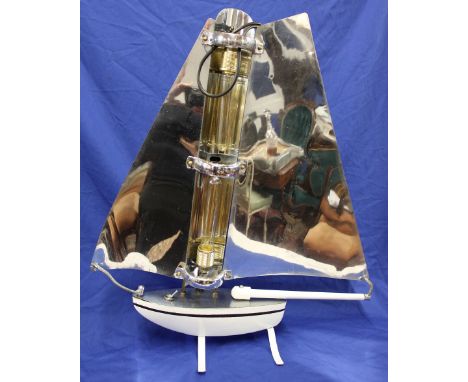 A 1930's Art Deco "Bunting Yacht" floor lamp, originally a two-bar electric fire converted with twin bulb lighting, rewired, 