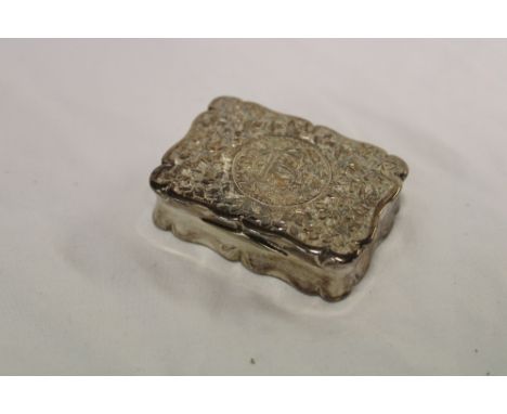 A late Victorian silver rectangular snuff box with engraved leaf decoration and initials, Birmingham marks 1899 2" long