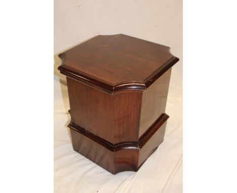 A Victorian mahogany square commode with ceramic liner and hinged lid