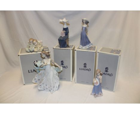A collection of five Lladro china figures including large unboxed female figure and four various boxed figures (one with slig